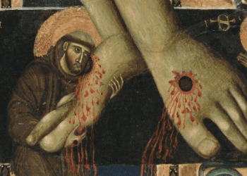 San Francesco abbraccia i piedi di Cristo