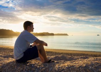preghiera in spiaggia